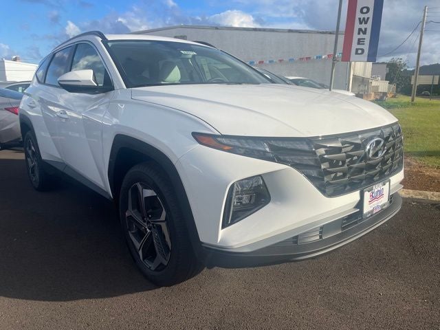 2024 Hyundai TUCSON SEL in White Pearl — front three-quarter view