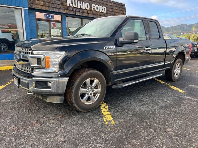 2018 Ford F-150 XLT in Shadow Black — front three-quarter view