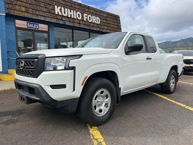 2022 Nissan Frontier S in Glacier White — front three-quarter view