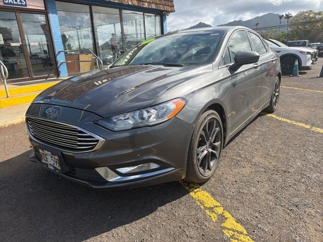 2018 Ford Fusion SE in Magnetic — front three-quarter view