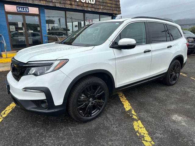 2021 Honda Pilot Special Edition in White — front three-quarter view